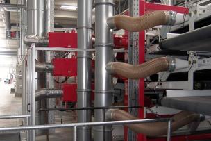 Staubabsaugung für Flexo-Druck-Stanzmaschinen